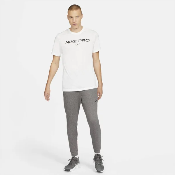 Nike Men's Dri-Fit Tapered Training Pants in Grey/Charcoal Heather Size 4XLT - Cotton/Polyester