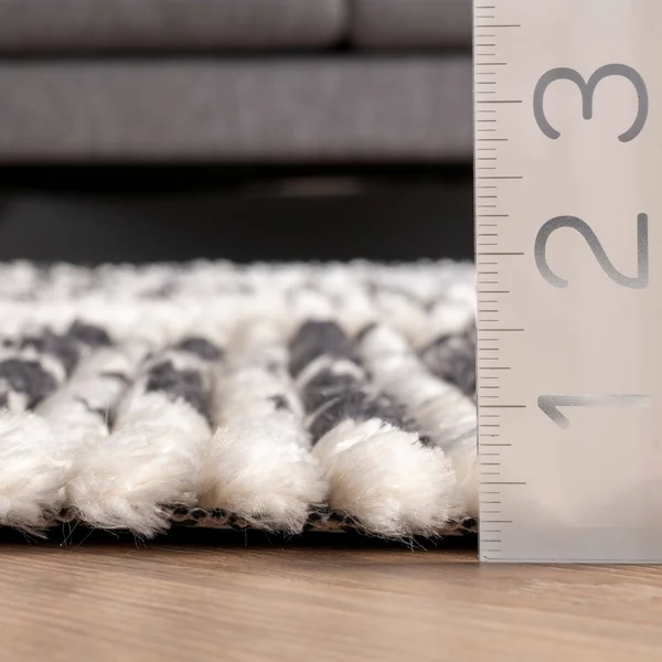 nuLOOM Celia Soft Shag Abstract Aztec Fringe Beige 6 ft. 7 in. x 9 ft. Indoor Area Rug