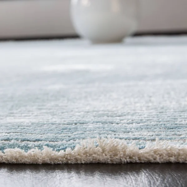 Safavieh Dream Turquoise/Grey 5 ft. x 8 ft. Abstract Area Rug